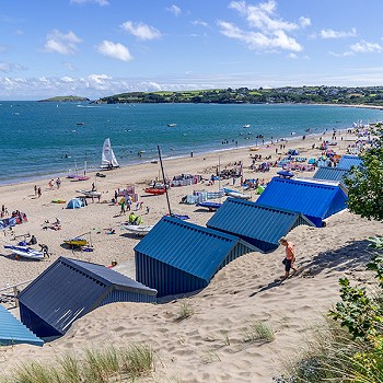 Abersoch beach with blue beach huts