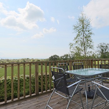table and chairs on to a balcony