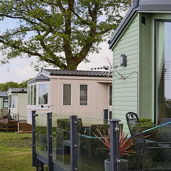 row of different caravans with balconies